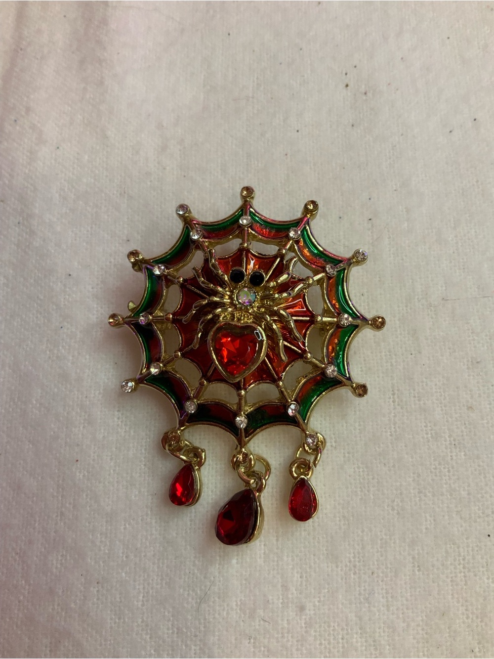 Gold-Tone Spider Web Brooch/Pendant with Red and Green Accents (Y-12)